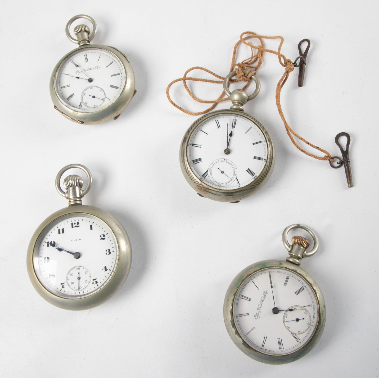 (4) Pocket Watches: (4) Pocket Watches to include Elgin OF pocket watch, SN 6920174, grade 96, 1897, 18S 7Jin Fahys Ore Silver no. 1 case 349650, running at time of testing, dial with sunken seconds track, blued steel ha