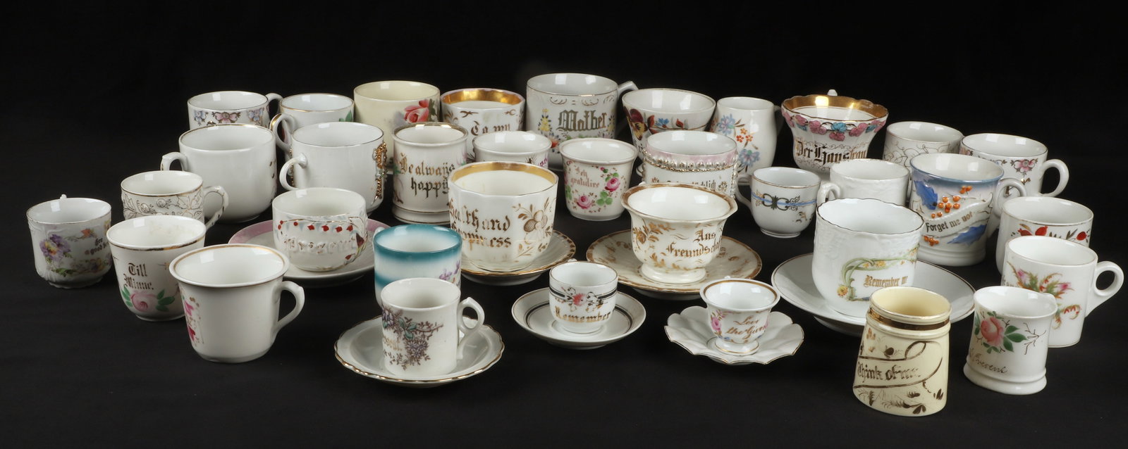 (30+) Porcelain motto cups: (30+) Porcelain motto cups, including "Forget Me Not", "Present", "Mother", "Father", "A Present", and more, some with chips