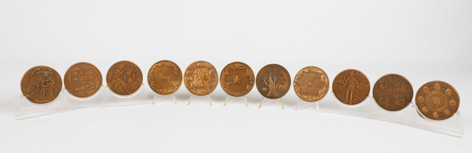 (11) Franklin Mint Bronze Calendar medallions: (11) Franklin Mint Bronze Calendar medallions, 1973-1977, 1979-1980, 1982-1985, 3" dia