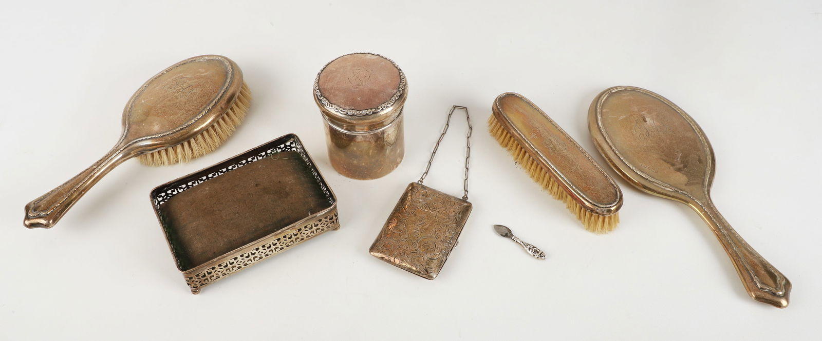 A Collection of Sterling and Mounted Vanity Items (1 of 3)