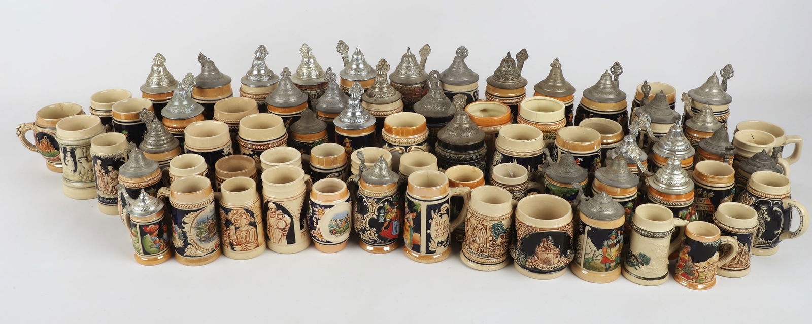 (70) Miniature pottery steins (1 of 11)