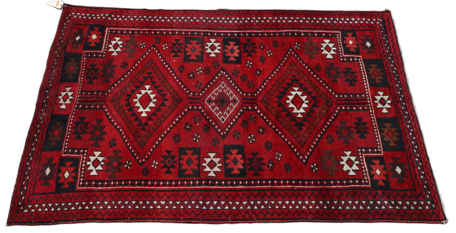 5'5" x 7'11" 20th Century Baluch Rug: 5'5" x 7'11" 20th Century Baluch Rug, some ripping in the carpet, needs repair