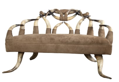 Steer horn and upholstered sofa