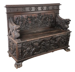 Heavily carved chest bench