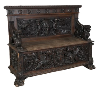Heavily carved chest bench