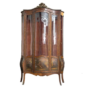 French style serpentine curio cabinet