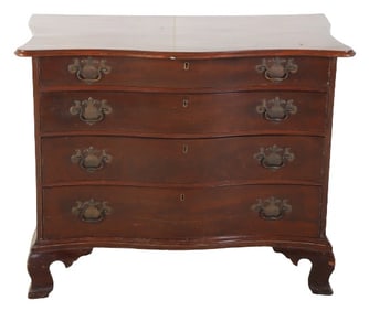 Walnut serpentine bachelor's chest
