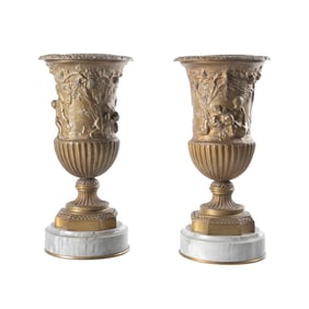 A Pair of Marble Raised Putti Relief Decorated Urns