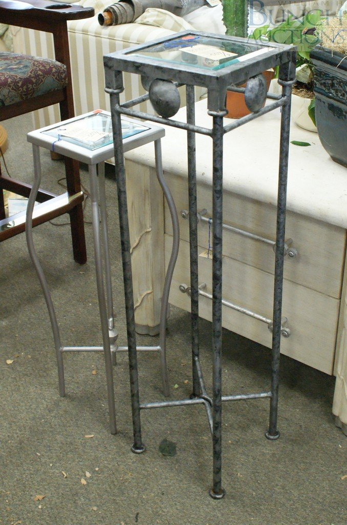 (2) Metal pedestals with glass tops, 30" h & 39" h: (2) Metal pedestals with glass tops, 30" h & 39" h