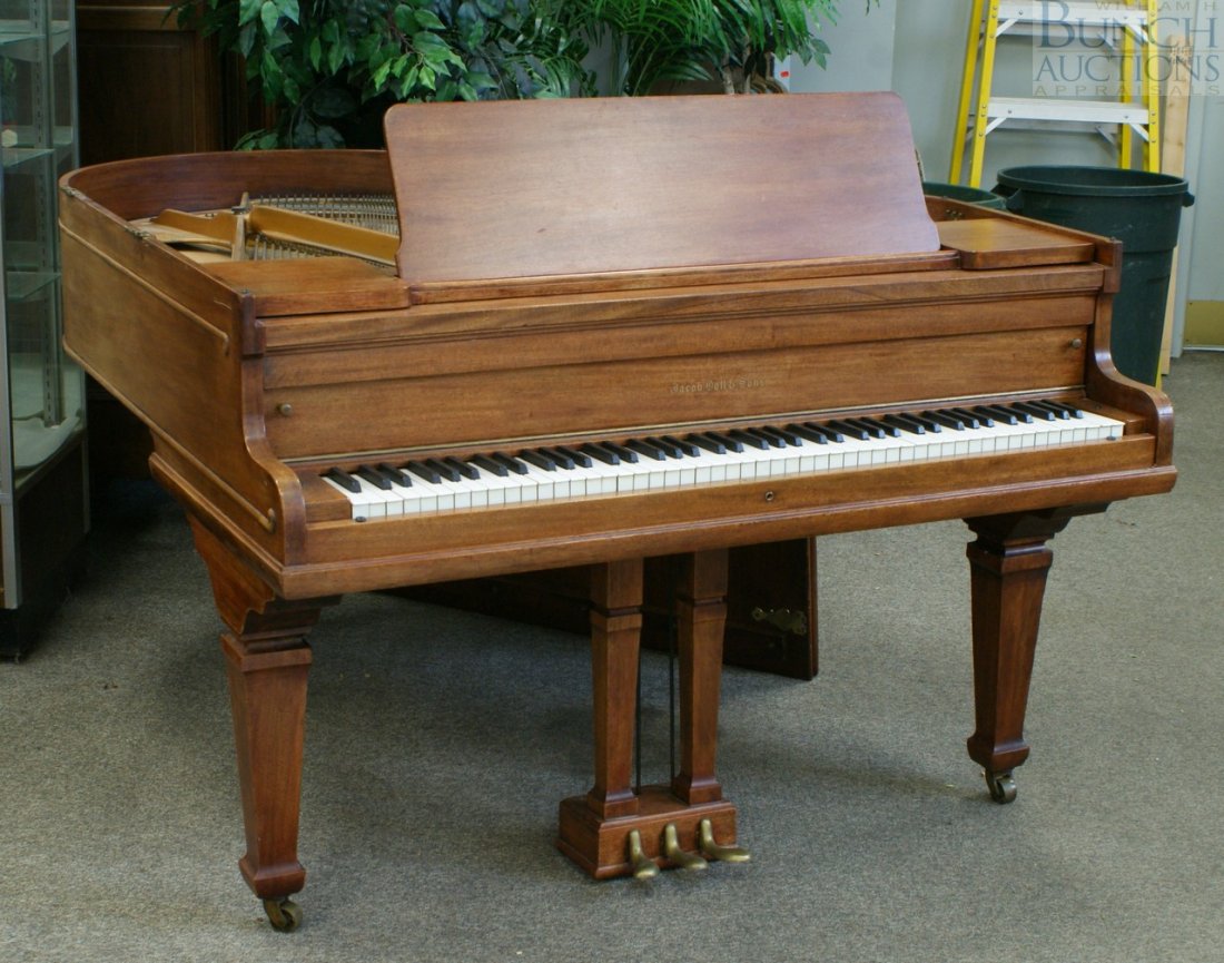 Jacob Doll & Sons Mahogany Cased Baby Grand Piano: Jacob Doll & Sons Mahogany cased baby grand piano, soundboard marked "Doll & Sons New York", 63" deep x 55" wide