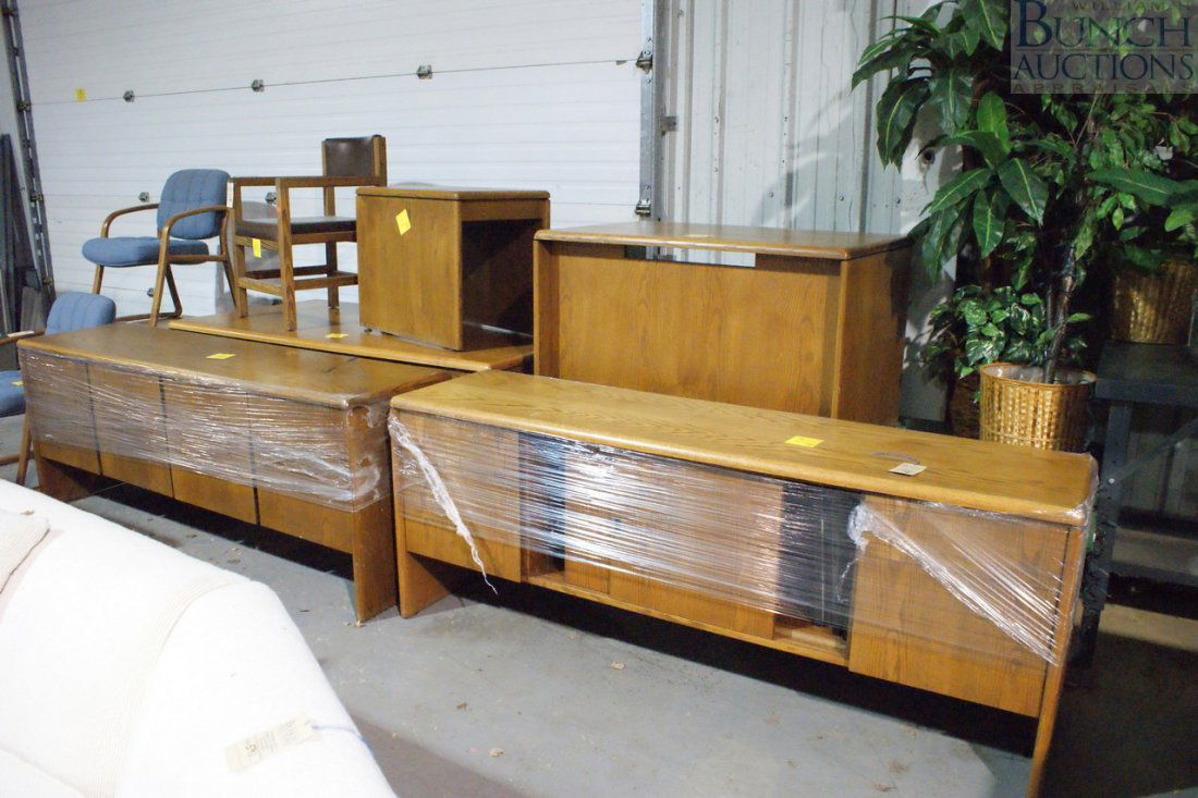 6pc oak finished office set to include 2 credenzas: 6pc oak finished office set to include 2 credenzas, printer stand, writing desk, rectangular stand, and a square stand