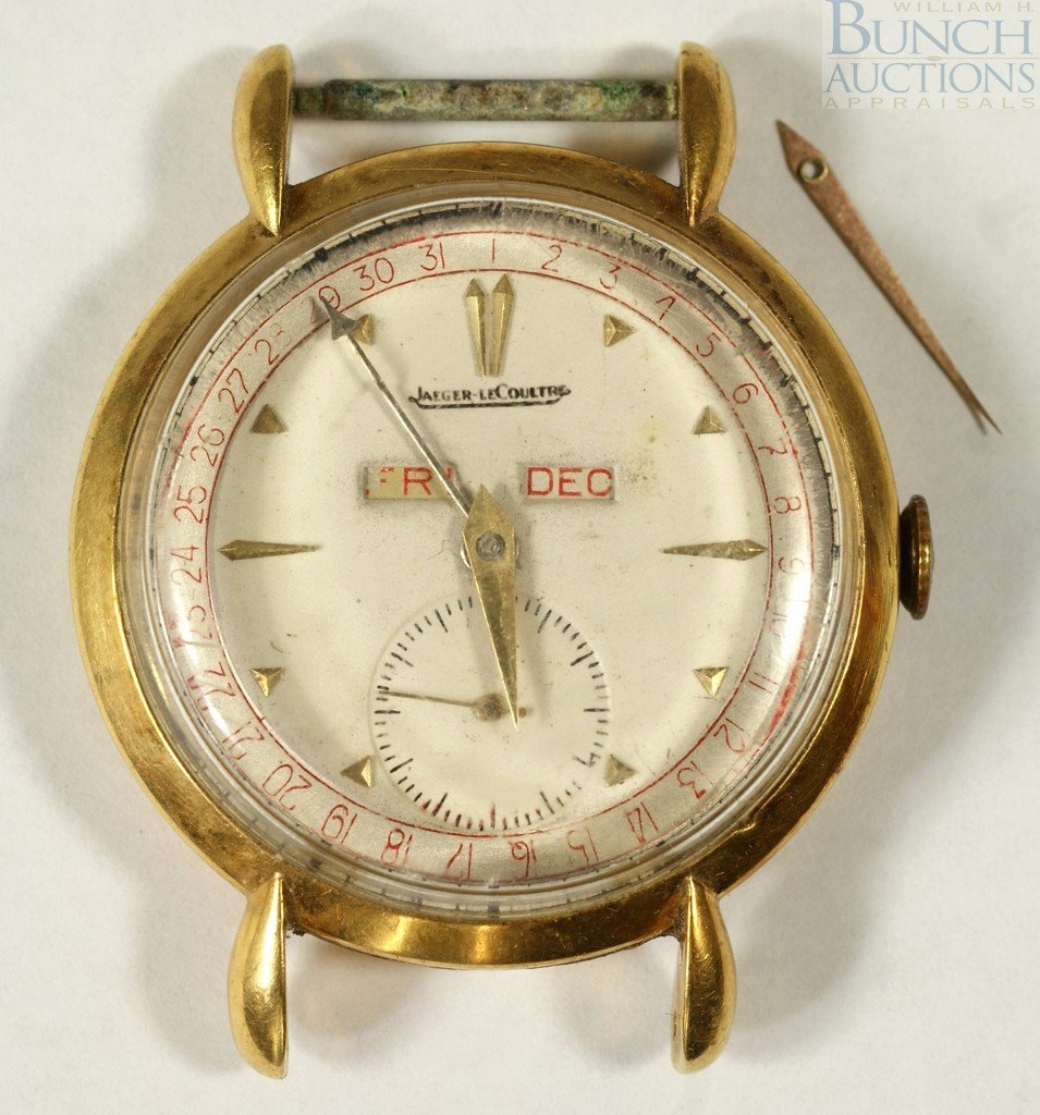 18K YG Jaeger LeCoultre triple date mans wrist w: 18K YG Jaeger LeCoultre triple date mans wrist watch, winding stem pulls out, minute hand needs to be reset, movement very clean, but watch needs to go through restoration process, has a little scuffi