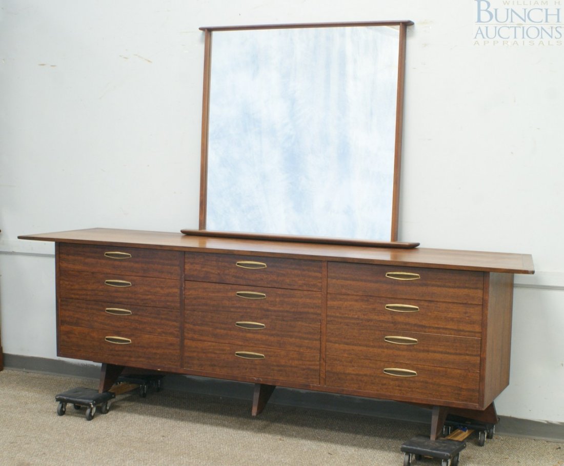 Nakashima for Widdicomb walnut 12 drawer dresse: Nakashima for Widdicomb walnut 12 drawer dresser with recessed brass pulls, branded GEORGE NAKASHIMA and with Widdicomb fabric label, 105 1/2" w x 32" h x 22" d, with mirror