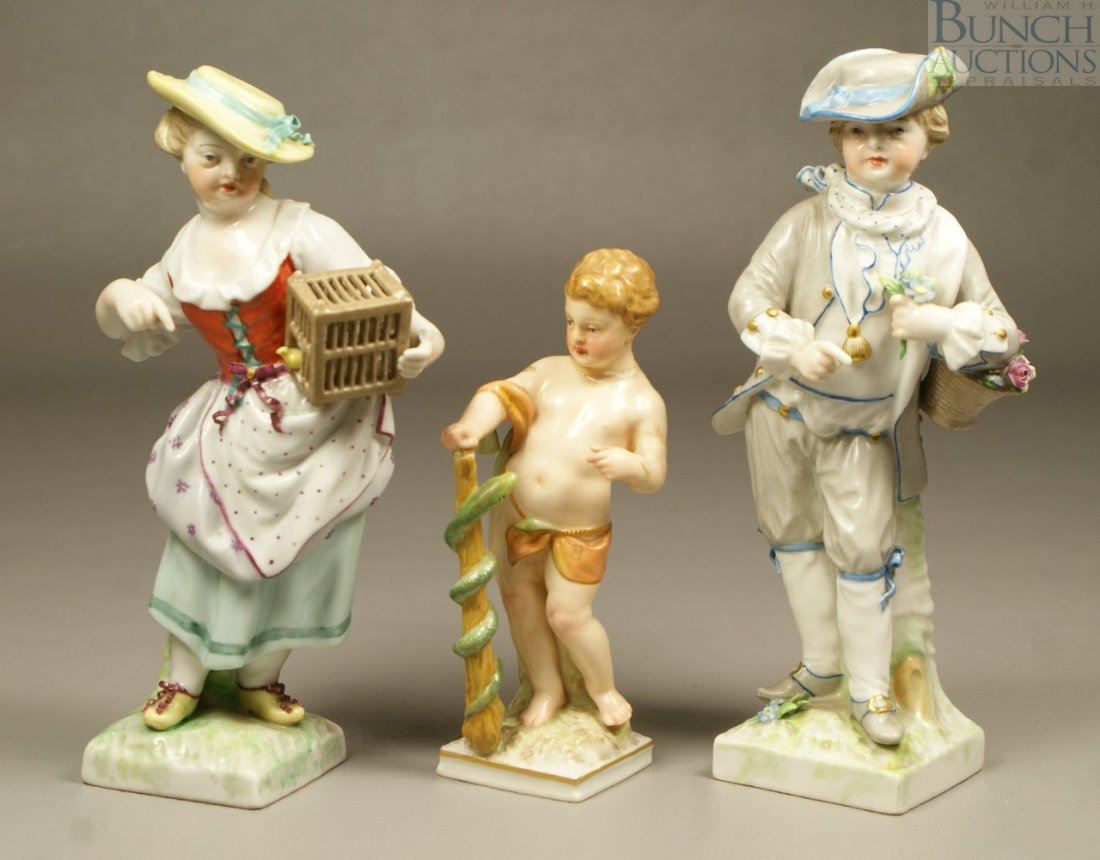 (3) KPM porcelain figurines, woman with bird cag: (3) KPM porcelain figurines, woman with bird cage, missing her left thumb and the door to the cage, young boy carrying basket of flowers, 6" tall, and a child with colied snake on shaft, repaired arm,