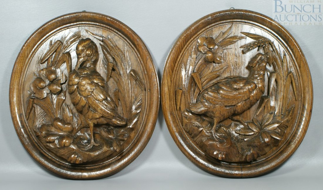 Pr carved oak Black Forest wall plaques depictin: Pr carved oak Black Forest wall plaques depicting game birds, 19th/20th c, 18 1/2" x 16 1/2"