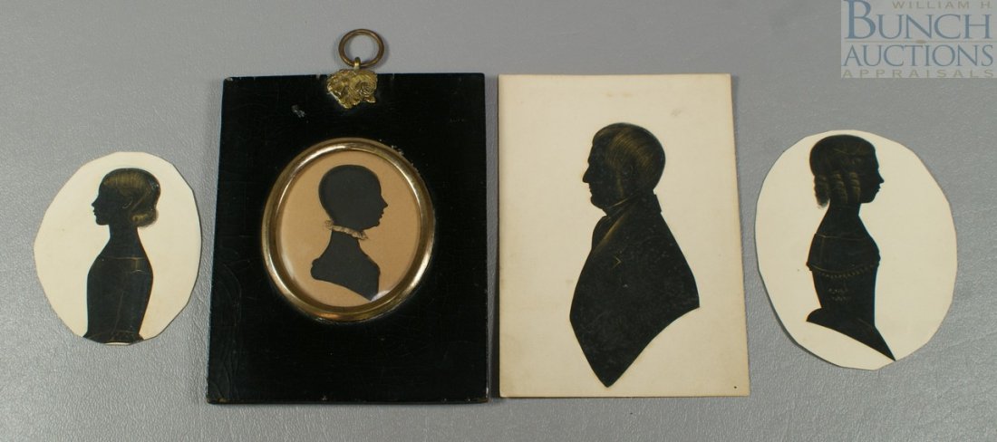 C. 1820s portrait of a lady. A painted silhouett: C. 1820s portrait of a lady. A painted silhouette housed in original ebonized frame with gilt bezel and rose loop fitting. 2.5x2" Together with three unframed paper cut out silhouettes, two young girl