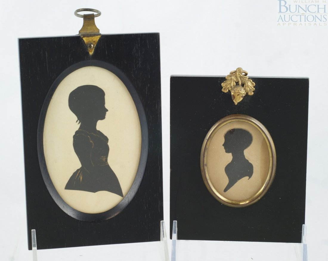 (2) Portraits both of young ladies. A cut paper : (2) Portraits both of young ladies. A cut paper silhouette gilded at the dress. Housed in ebonized hardwood frame. 3.75x2.5" Painted silhouette in ebonized frame, brass inner bezel, convex glass, and 