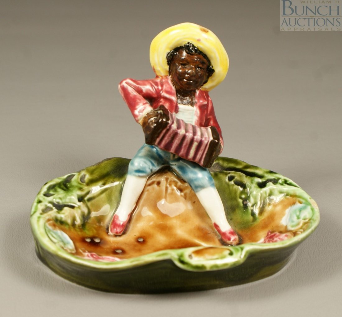 Continental Majolica black Americana of young bo: Continental Majolica black Americana of young boy with banjo, minor flake to edge of bowl, 4" h