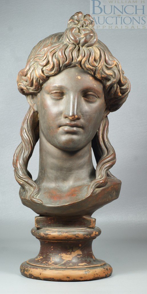 Classical terra cotta bust of a young maiden, im: Classical terra cotta bust of a young maiden, impressed mark 114 to back, some wear to original finish, 18 1/2" h