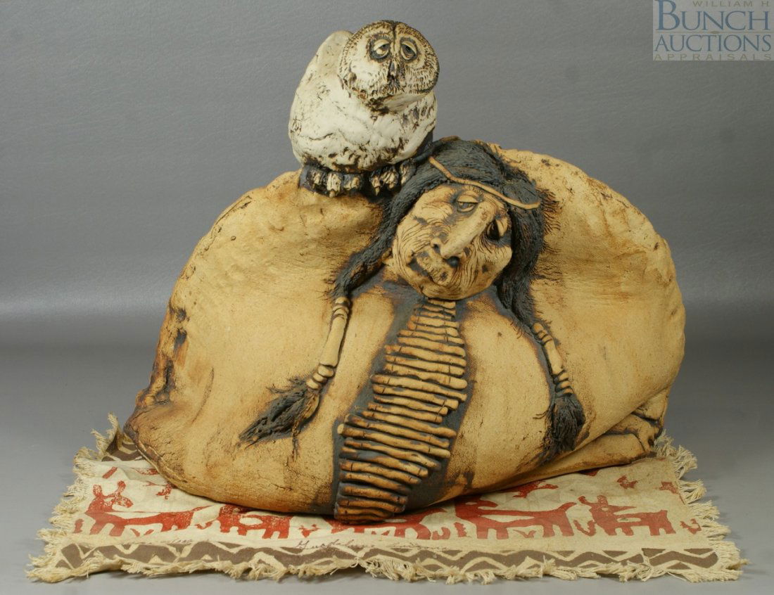 Todd Warner ceramic sculpture of an Indian with: Todd Warner ceramic sculpture of an Indian with an owl titled "Wise like an Owl" and dated 1983, approx. 21" wide x 16" high