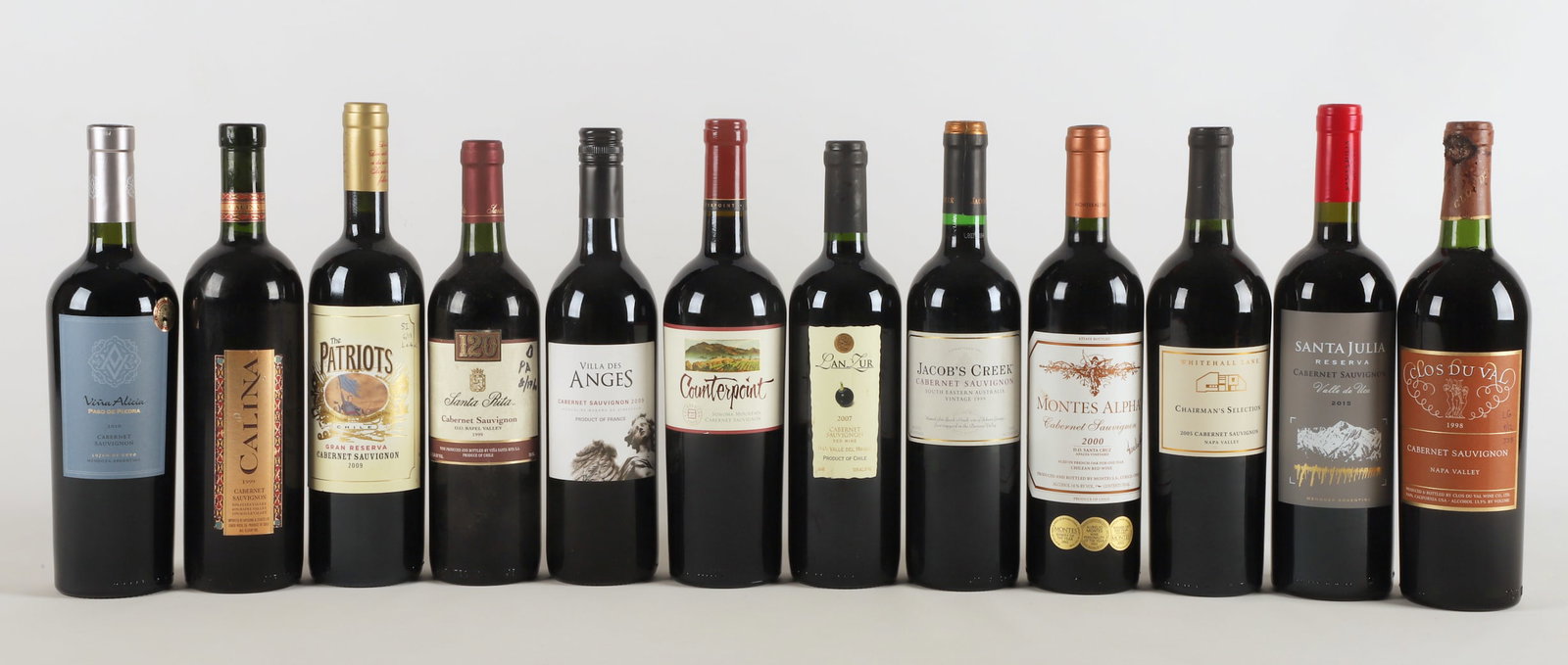(12) Assorted bottles of Cabernet Sauvignon wine: (12) Assorted bottles of Cabernet Sauvignon wine, 750 ml, Calina Chile 1999, Whitehall Lane Napa Valley Chairman's Selection 2005, Lujan de Cuyo Vina Alicia Paso de Piedra Argentina 2010, Clos du Val 