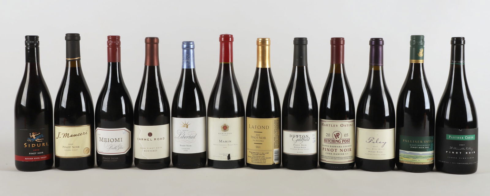 (12) Assorted bottles of Pinot Noir wine: (12) Assorted bottles of Pinot Noir wine, 750 ml, including Dutton Ranch Goldfield Russian River Valley 2009, Carmel Road Monterey 2008, Roley Rancho Santa Rosa Sta Rita Hills 2007, J Manceri Sonoma C