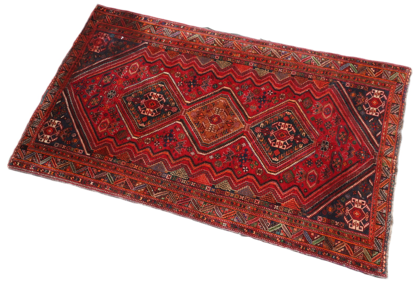 5'11" x 9'11" South Persian Rug: 5'11" x 9'11" South Persian Rug, fair to poor condition, staining wear to all edges, spot stain at (1) corner, and some signs of pest damage