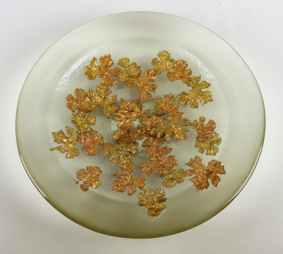 George Bucquet Art Glass Center Bowl: George Bucquet (American, b. 1954) Art Glass Center Bowl, hot cast clear glass with underside incised leaves in gilt highlight, shallow central basin with wide rim, signed Bucquet at foot, 18" dia. Ge