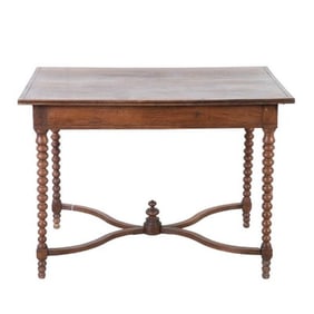 Walnut carved library table