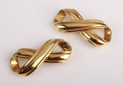 A Pair of 18K Craig Drake Infinity Slides