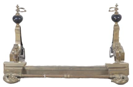 Pair Regency style gilt metal and ebonized andirons