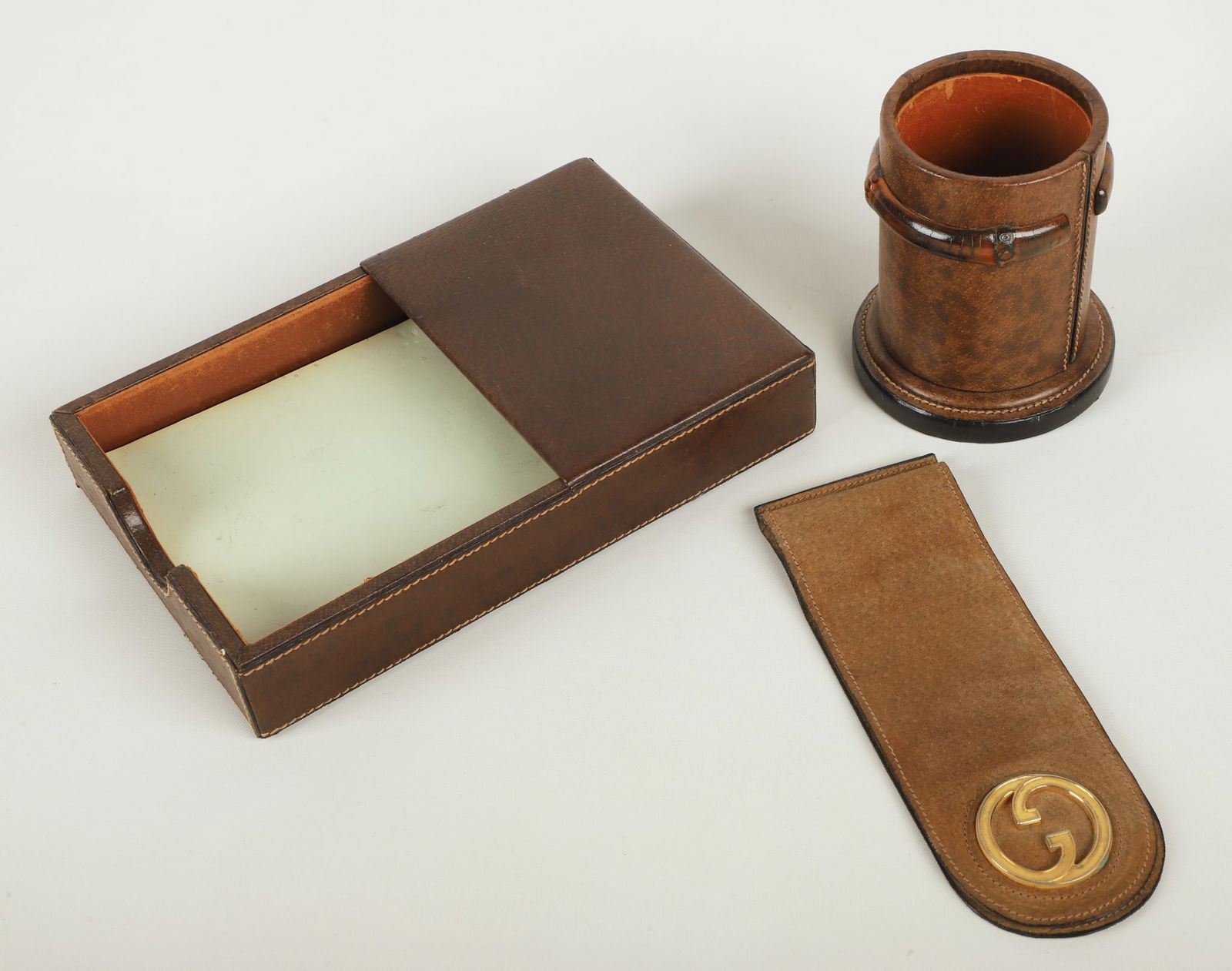Gucci leather note box, pencil cup & bookmark: (3) Gucci leather desk items, including note box, pencil cup & bookmark