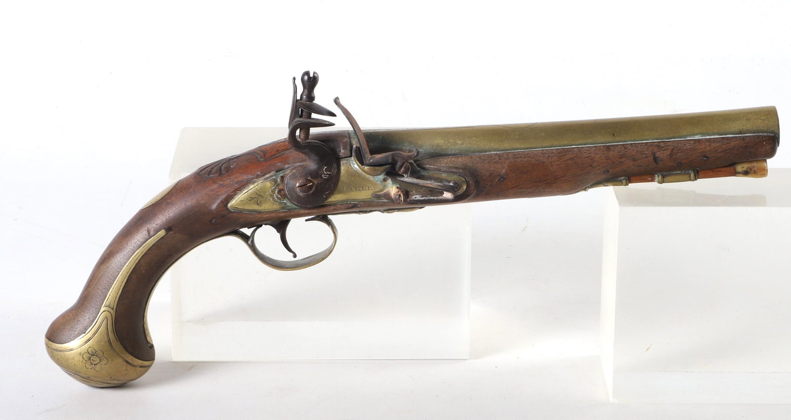 Parkes London brass barrel flintlock pistol: Parkes London brass barrel flintlock pistol, 8" brass barrel, marked London on top, Parkes on side hammer guard, acorn embellished trigger guard, brass butt, repair to wood, finish loss