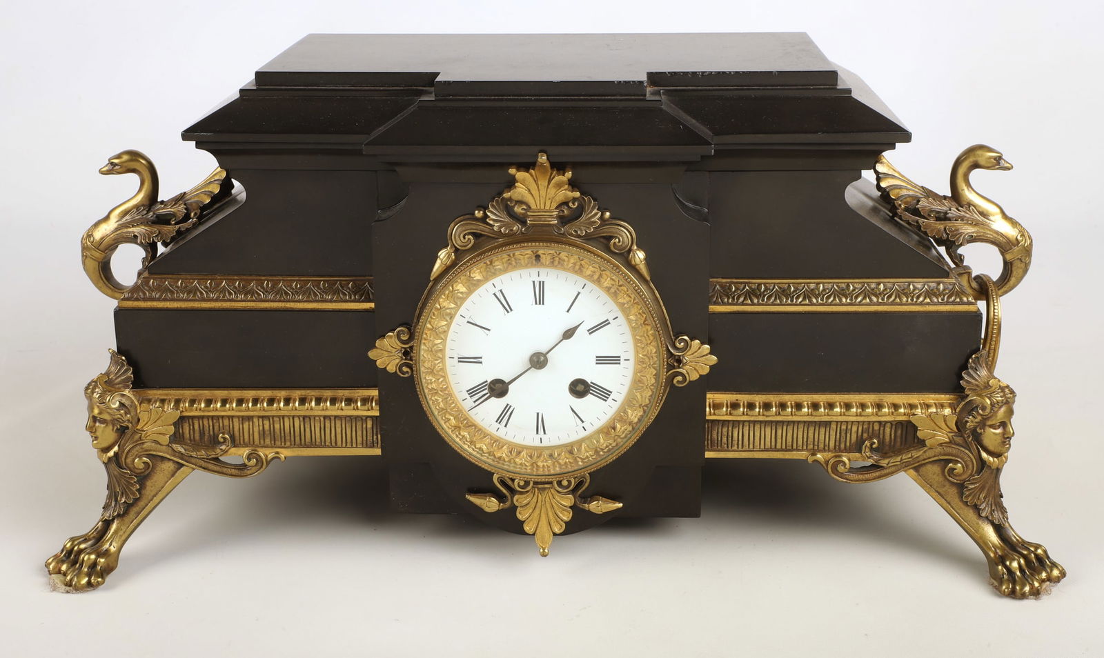 French Neoclassical Style Bronze Mounted Clock: French Neoclassical style bronze mounted clock, black marble with gilt bronze mounts, Japy Freres movement for John Bennett, London, 9-1/4" x 19-1/4" x 8", very good condition