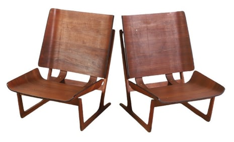 Pair Herman Miller style teak and ebonized floating lounge chairs