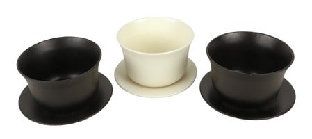 (3) Elsa Peretti for Tiffany and Co. Orchid Pots: (3) Elsa Peretti for Tiffany and Co. Orchid Pots to include (2) black glazed terracotta tri-foot orchid pots with underplates, (2) fleabites to rim of (1) along with a white glazed tri-foot terracotta