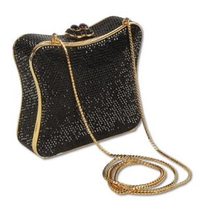 Judith Leiber Swarovski Black Crystal Minaudiere: Judith Leiber Swarovski Black Crystal Minaudiere, double cabochon press closure, gold colored leather interior, includes gold tone accessories as provided by Leiber, suspended on a gold tone chain, do