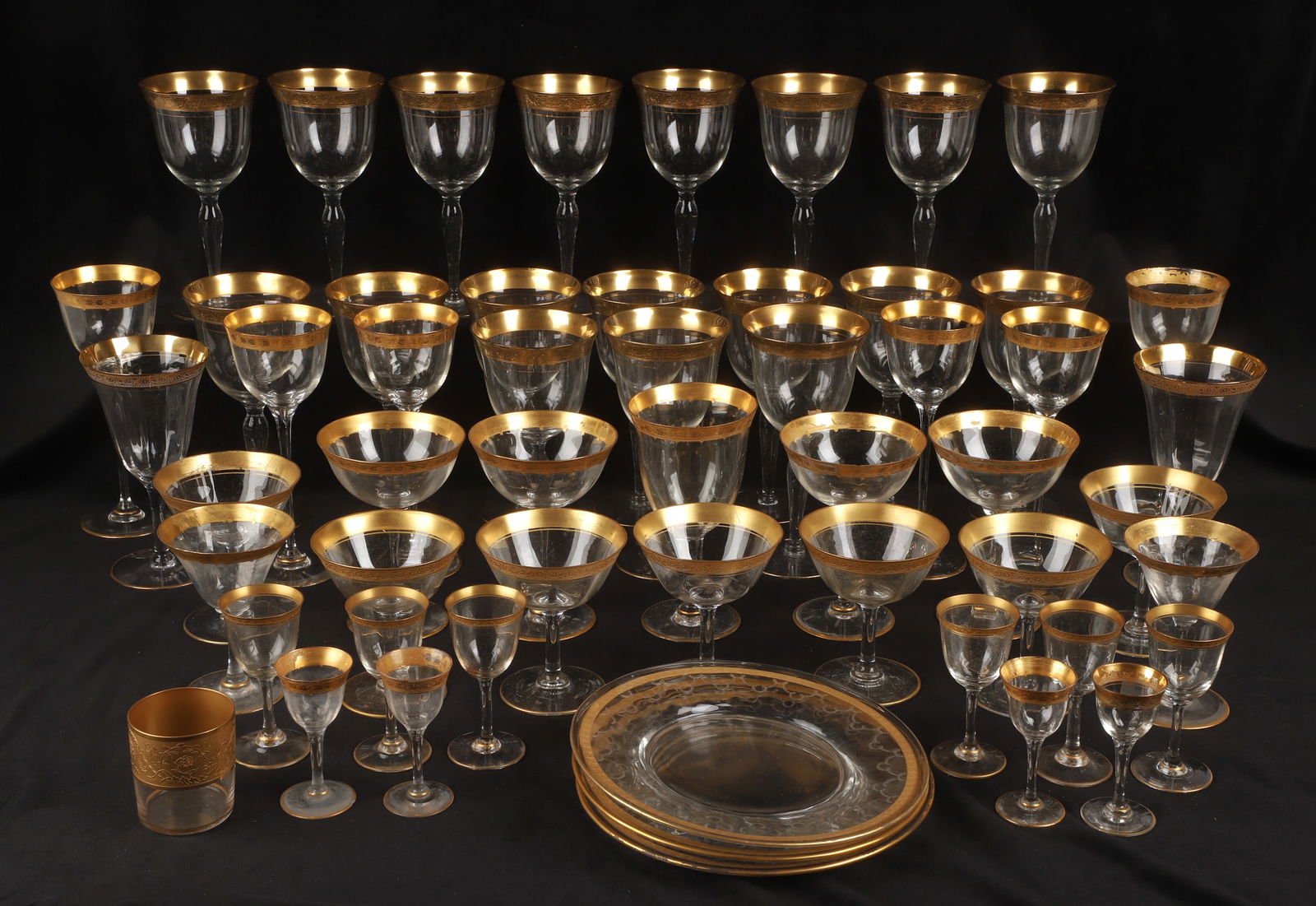 A Large Collection of Gilt Edge Glassware: A Large collection of gilt edge glassware, including goblets, white wines, aperitifs, etc. some with wear to gold.