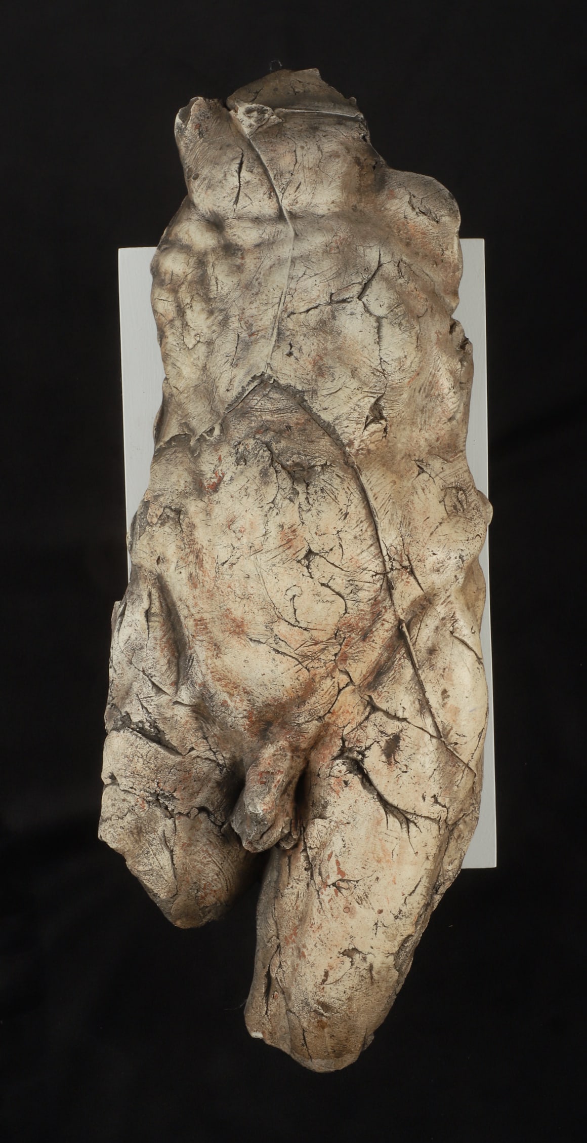 Studio Pottery of a Male Nude: Studio Pottery of a Male Nude, 17"L x affixed floating to a plinth, with hook for wall hanging, apparently unsigned.