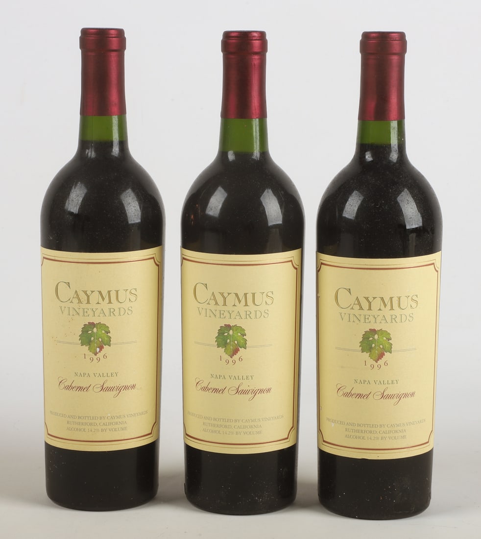 (3) 1996 Caymus Cabernet Sauvignon: (3) 1996 Caymus Cabernet Sauvignon, stored in an underground wine cellar.