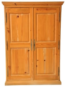 Softwood carved paneled wardrobe