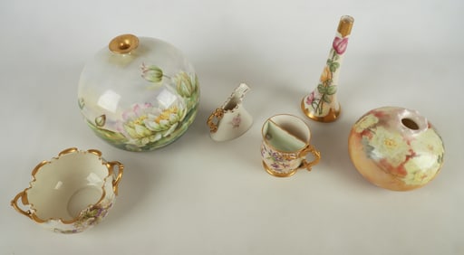 A Collection of Floral and Parcel Gilt Belleek Porcelain