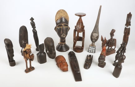 A Collection of African Carved Wood Figures