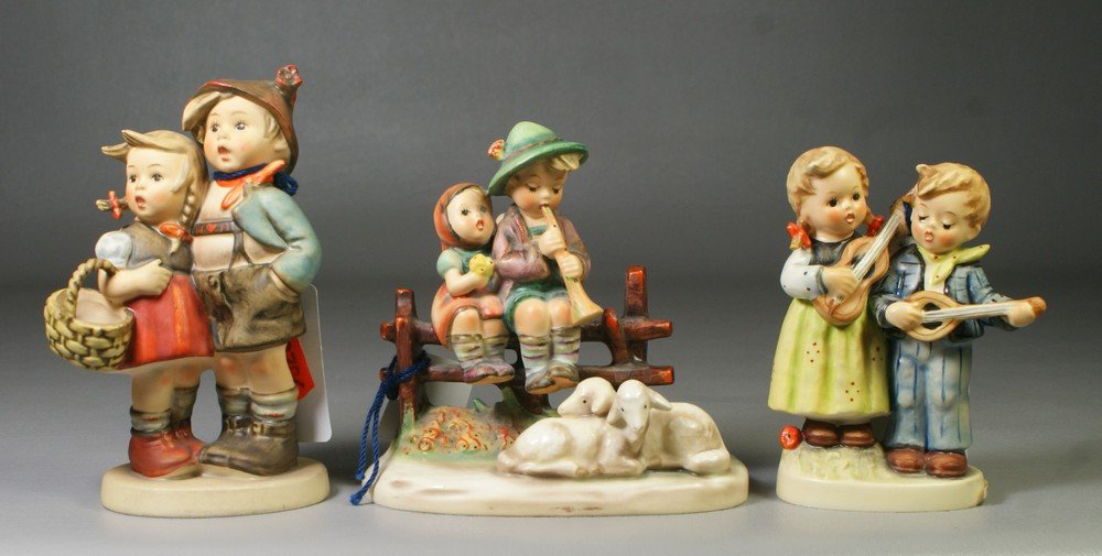 (3) Hummel figurines, Eventide Hum 99, Happy Day: (3) Hummel figurines, Eventide Hum 99, Happy Days Hum 150 2/0 (some crazing), Surprise Hum 94/1 (slight chip on girl's hair), Happy Days Hum 150 2/0 (some crazing), TMK-3, tallest 5 1/2"