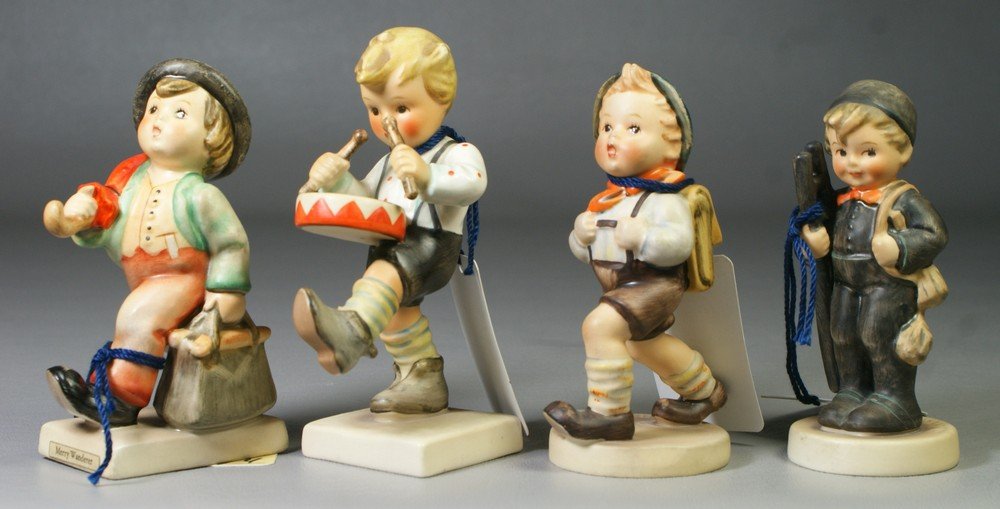 (4) Hummel figurines, School Boy Hum 32 2/0 (som: (4) Hummel figurines, School Boy Hum 32 2/0 (some crazing), Merry Wanderer Hum 11 2/0 (slight crazing), Chimney Sweep Hum 12 2/0 (slight crazing), Little Drummer Hum 240, TMK-3, tallest 4 1/2"