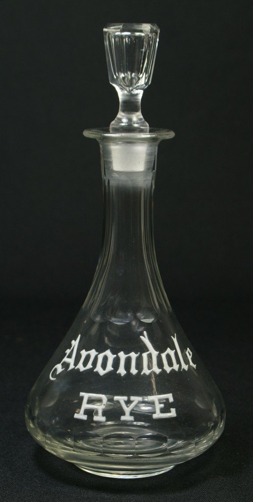 Clear glass back bar bottle with enameled decora: Clear glass back bar bottle with enameled decoration, AVONDALE RYE, 10 1/4", no damage