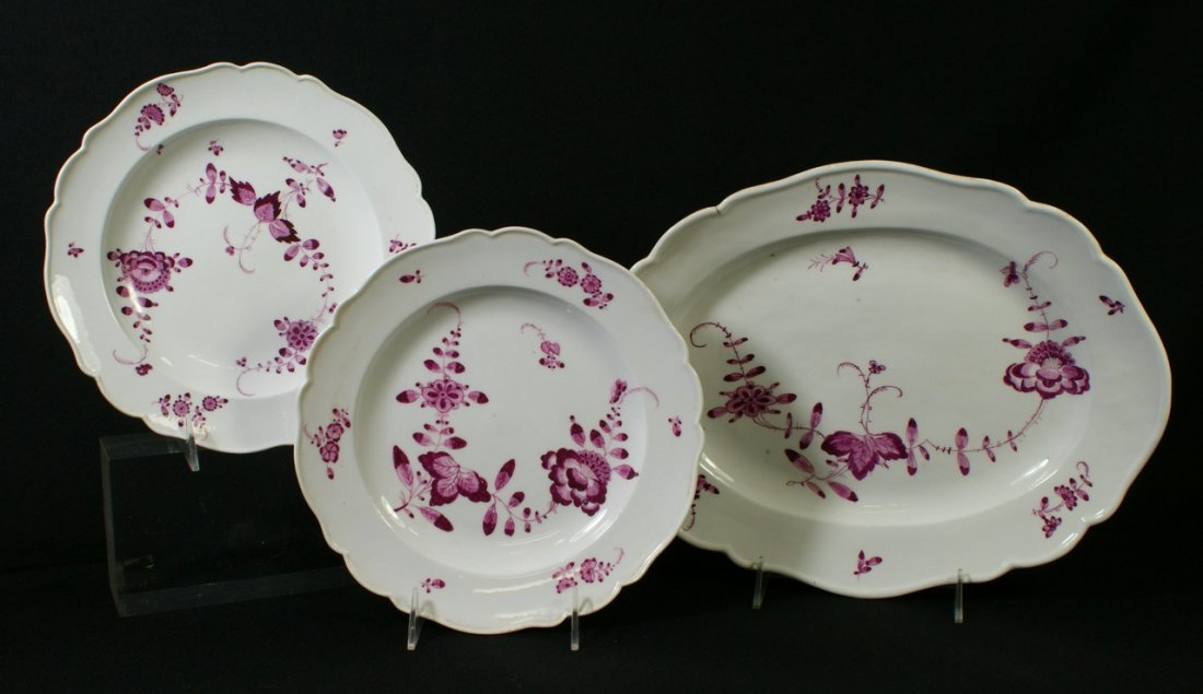 Meissen oval platter and 2 round plates in the pu: Meissen oval platter and 2 round plates in the purple Indian pattern, late 18th c mark with crossed swords with star below, platter 13 3/4", impressed D, plates 9 1/4", impressed 54 and 39/39, no dama