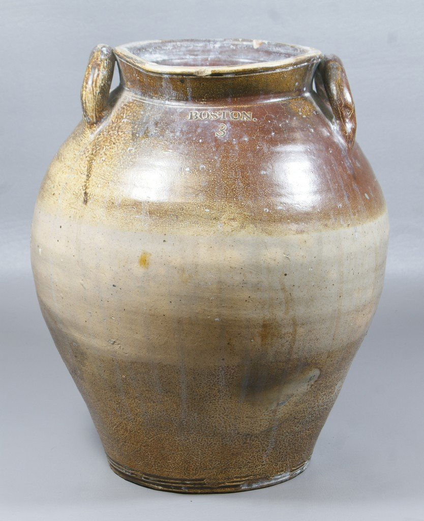 3 gallon ovoid Boston stoneware jar, shaded brown: 3 gallon ovoid Boston stoneware jar, shaded brown and tan, double open handles, chips around top and base, 13 1/2" tall, 11" d
