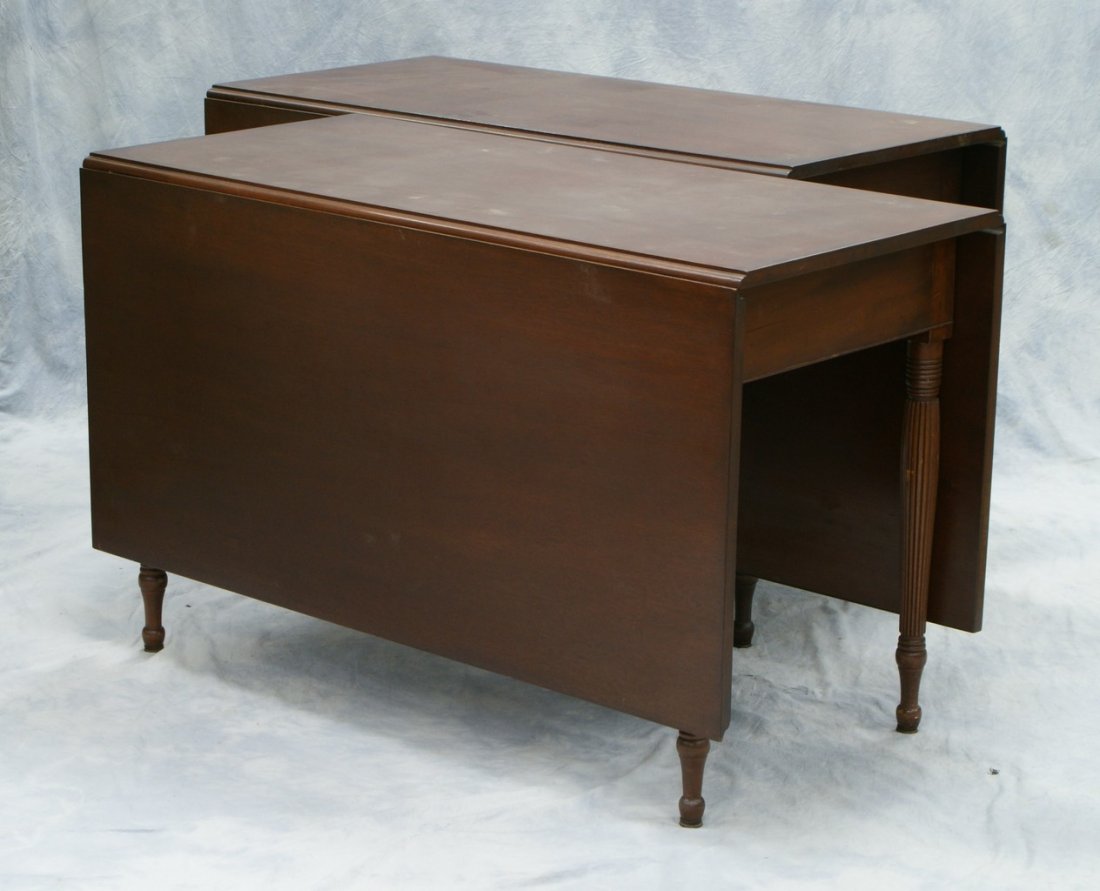2 part mahogany Sheraton style banquet table mad: 2 part mahogany Sheraton style banquet table made by Robert Treate Hogg, Oxford, PA, 1949, 48" w, 136" long extended