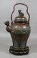 2415: Bronze champlevé tea kettle with foodog finial on